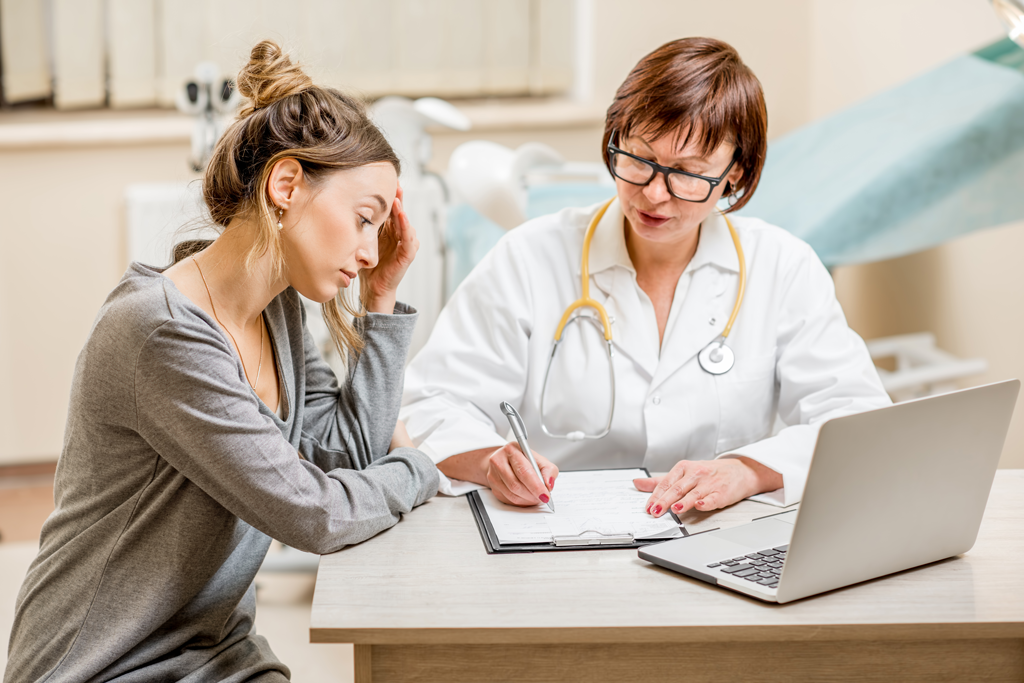 migraine patient with doctor
