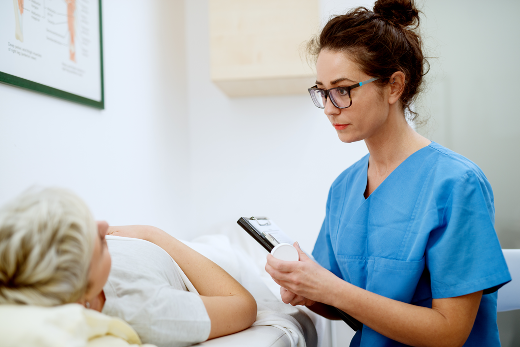 Female nurse taking care of a patient