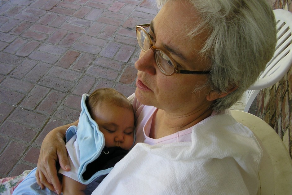 Grandmother cradling grandchild during HI FLA