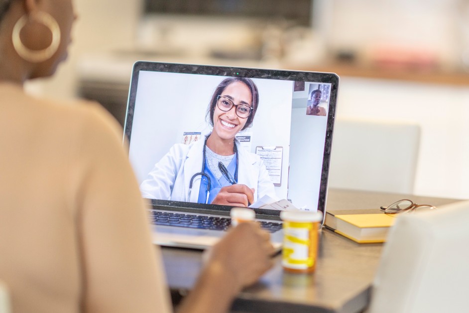 woman speaking to Dr via telemedicine