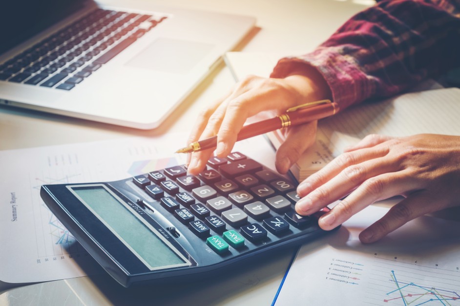 Woman calculating tax credits