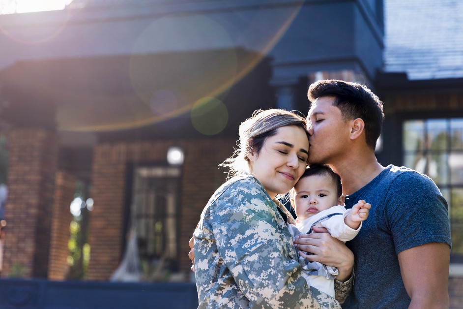 Father, child, and mother who is a military member