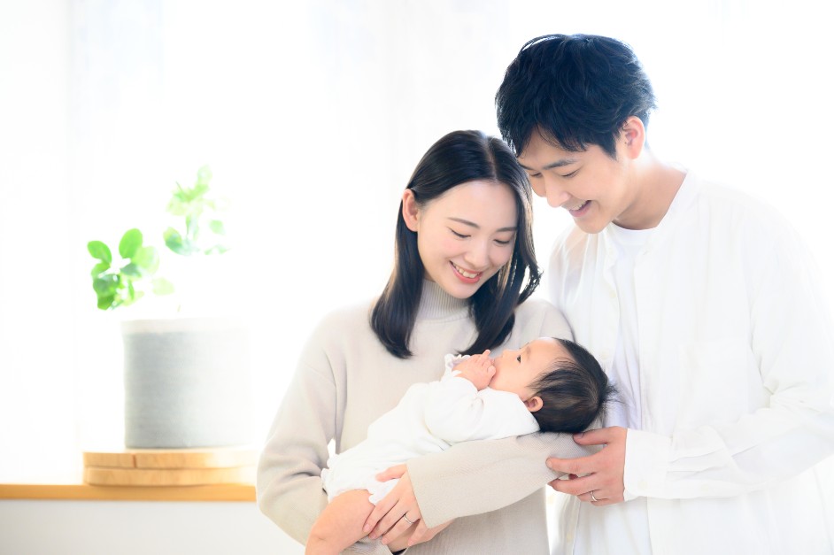 Family with new born baby